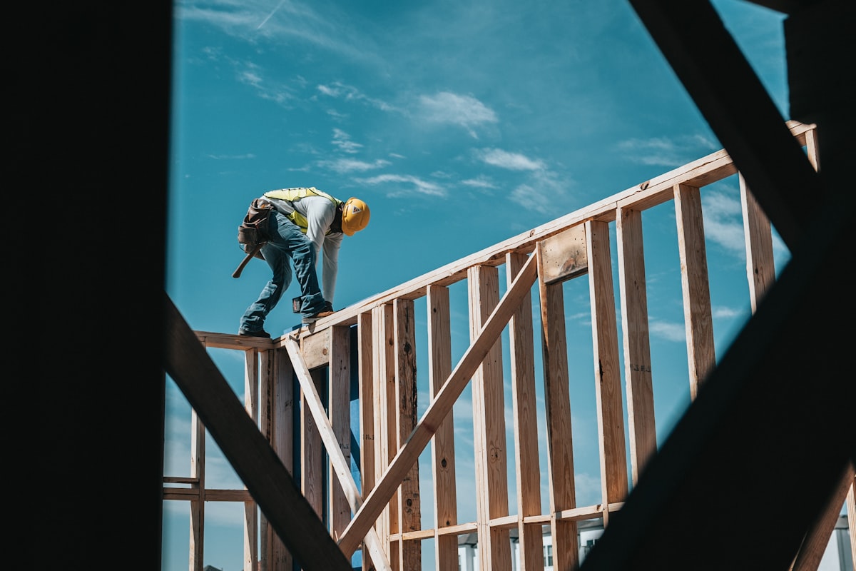 Australian tradie managing jobs and clients with mobile CRM